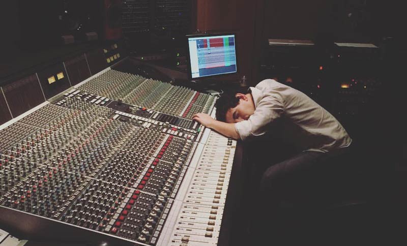 Tom Camp asleep at the console